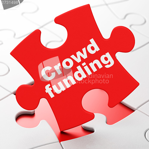 Image of Finance concept: Crowd Funding on puzzle background