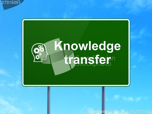 Image of Education concept: Knowledge Transfer and Head With Gears