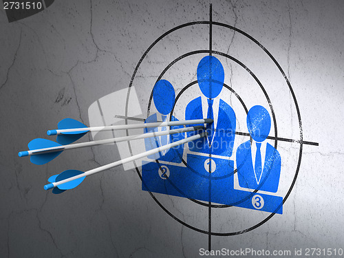 Image of Marketing concept: arrows in Business Team target on wall background