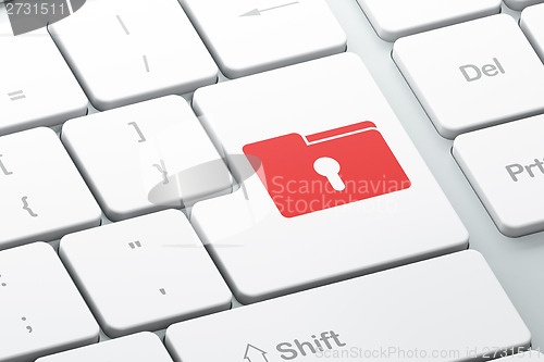 Image of Finance concept: Folder With Keyhole on computer keyboard background