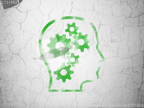 Image of Finance concept: Head With Gears on wall background