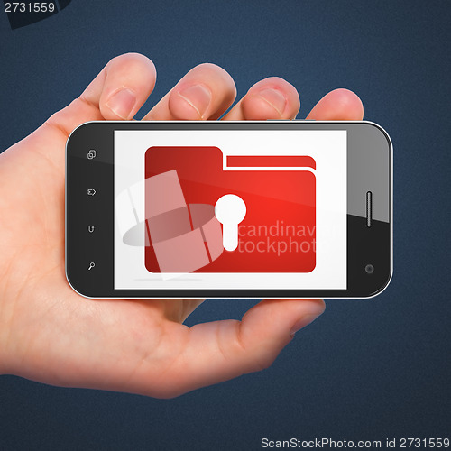 Image of Finance concept: Folder With Keyhole on smartphone