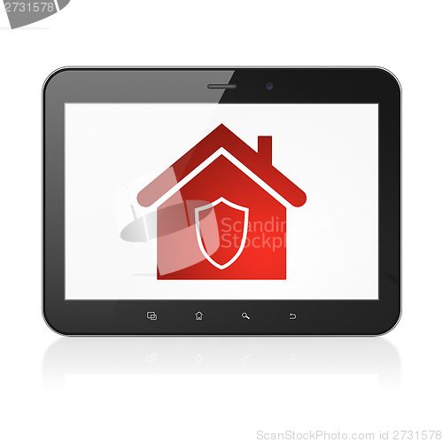 Image of Business concept: Home on tablet pc computer