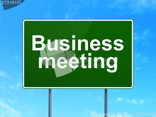 Image of Finance concept: Business Meeting on road sign background