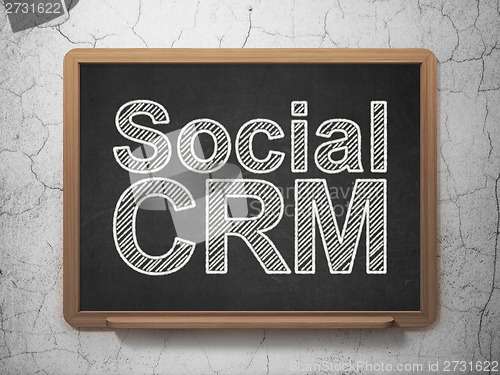 Image of Finance concept: Social CRM on chalkboard background