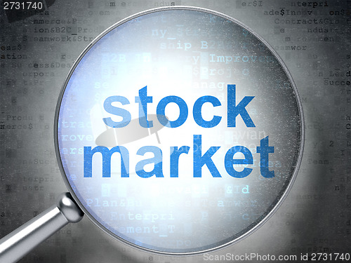 Image of Finance concept: Stock Market with optical glass