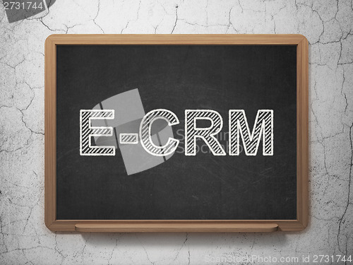 Image of Finance concept: E-CRM on chalkboard background