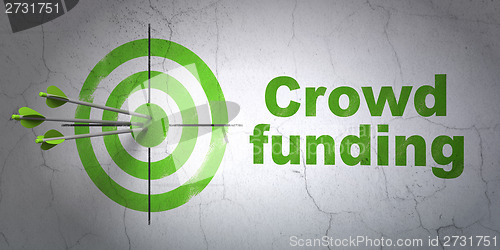 Image of Finance concept: target and Crowd Funding on wall background