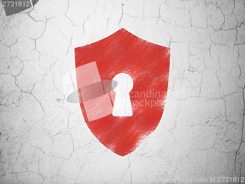 Image of Security concept: Shield With Keyhole on wall background