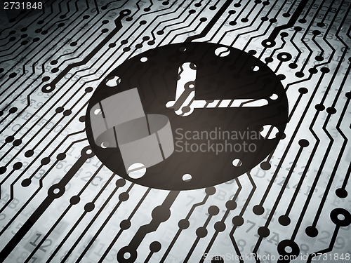 Image of Time concept: circuit board with Clock