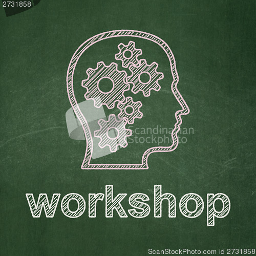 Image of Education concept: Head With Gears and Workshop on chalkboard background