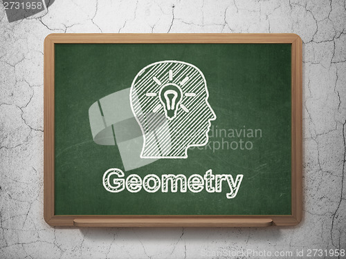 Image of Education concept: Head With Light Bulb and Geometry on chalkboard background