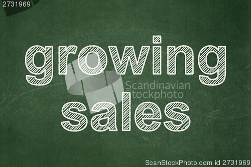 Image of Business concept: Growing Sales on chalkboard background