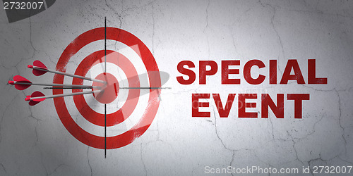 Image of Business concept: target and Special Event on wall background