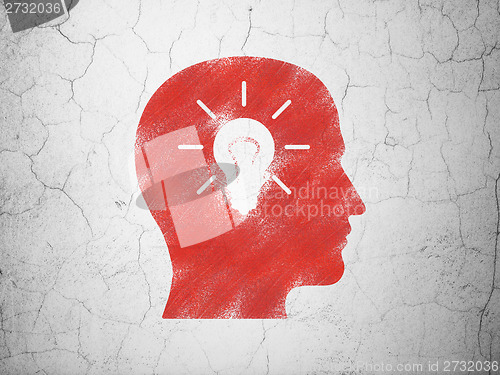 Image of Finance concept: Head With Light Bulb on wall background