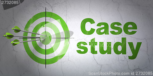 Image of Education concept: target and Case Study on wall background