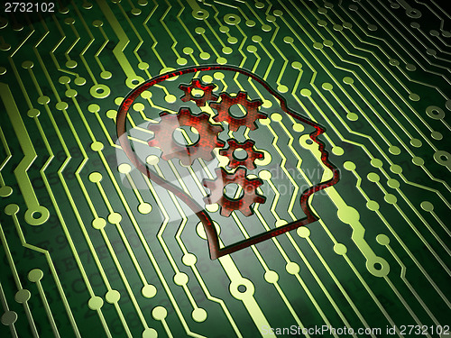 Image of Data concept: Head With Gears on circuit board background