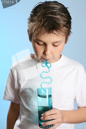 Image of Child drinking through a straw