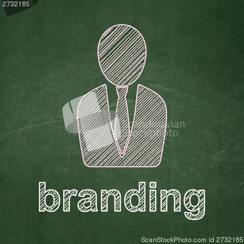 Image of Marketing concept: Business Man and Branding on chalkboard background