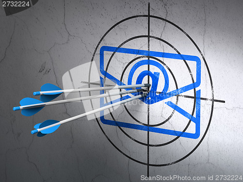 Image of Business concept: arrows in Email target on wall background