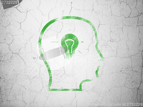 Image of Marketing concept: Head With Lightbulb on wall background