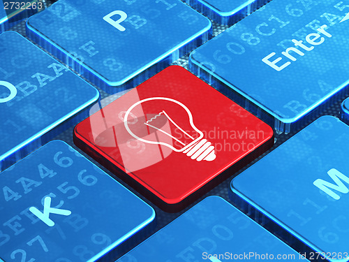 Image of Finance concept: Light Bulb on computer keyboard background