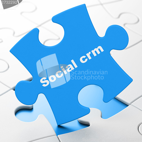 Image of Business concept: Social CRM on puzzle background