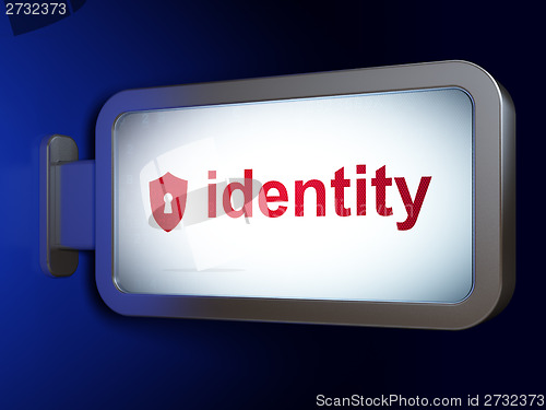 Image of Safety concept: Identity and Shield With Keyhole on billboard background