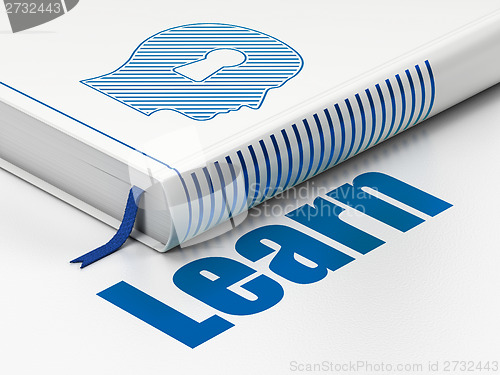 Image of Education concept: book Head With Keyhole, Learn on white background