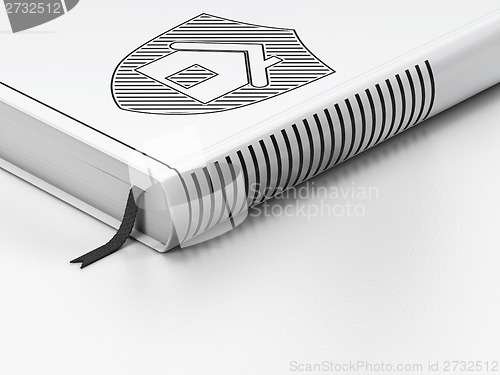 Image of Safety concept: closed book, Shield on white background