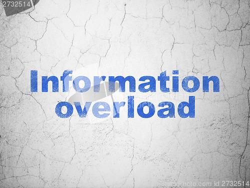 Image of Information concept: Information Overload on wall background