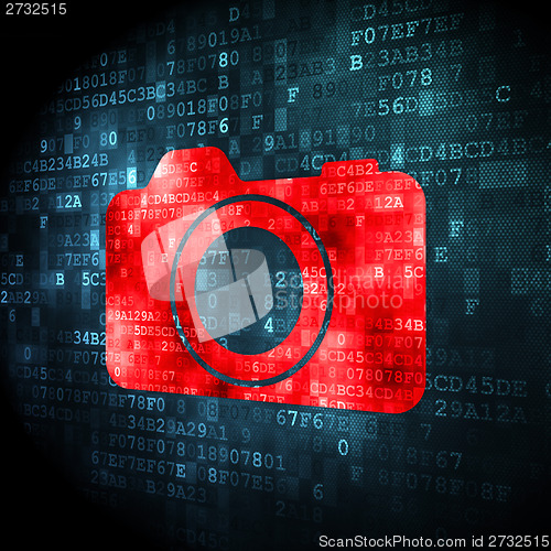 Image of Vacation concept: Photo Camera on digital background