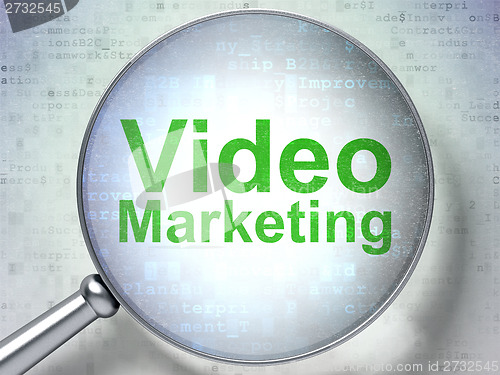 Image of Finance concept: Video Marketing with optical glass