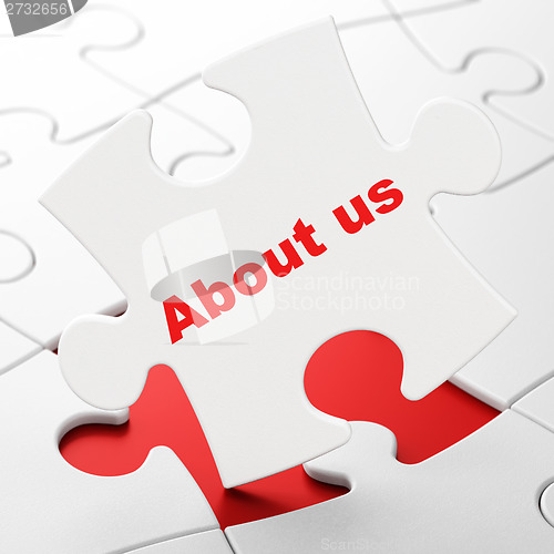 Image of Marketing concept: About Us on puzzle background