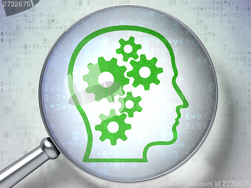 Image of Education concept: Head With Gears with optical glass on digital background