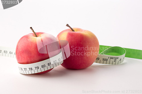 Image of Fresh apples with centimeter
