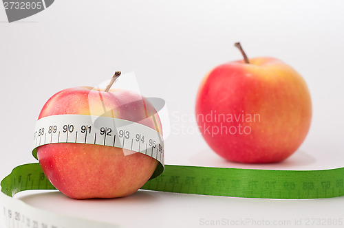 Image of Fresh apples with centimeter