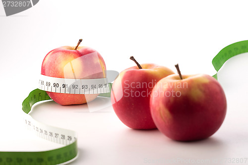 Image of Fresh apples with centimeter