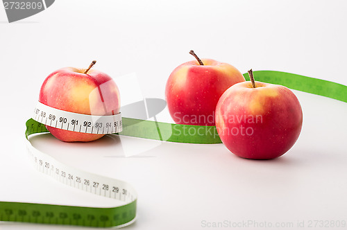 Image of Fresh apples with centimeter