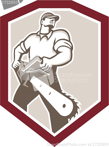 Image of Lumberjack Arborist Holding Chainsaw Shield