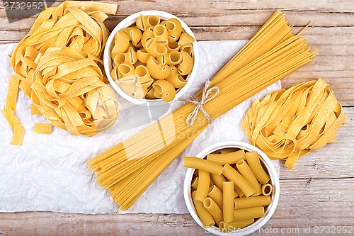 Image of raw pasta and white paper
