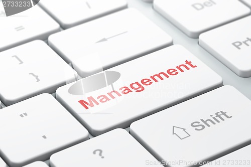 Image of Finance concept: Management on computer keyboard background