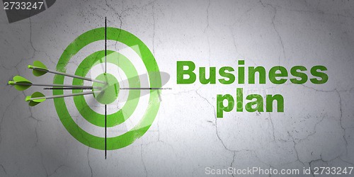 Image of Finance concept: target and Business Plan on wall background