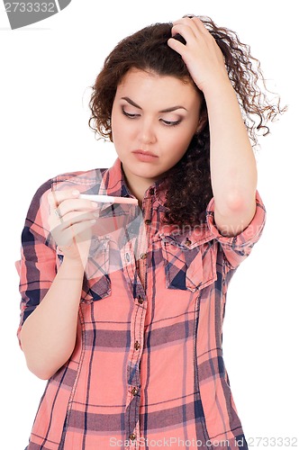 Image of Girl with pregnancy test