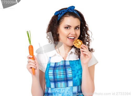 Image of Girl with carrot and cookie