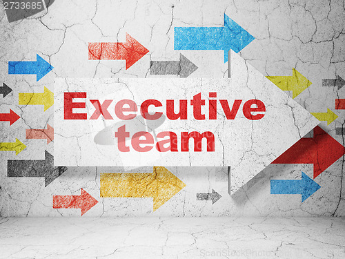 Image of Business concept: arrow with Executive Team on grunge wall