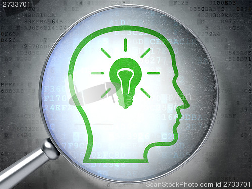 Image of Information concept: Head With Lightbulb with optical glass