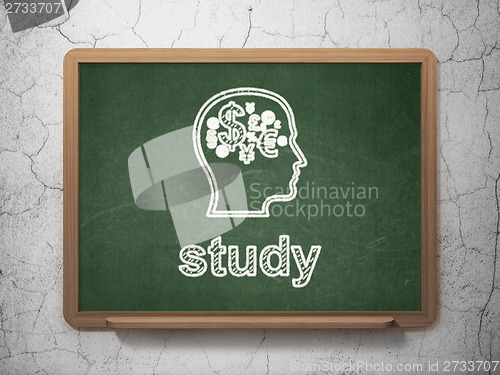 Image of Education concept: Head With Finance Symbol and Study on chalkboard background