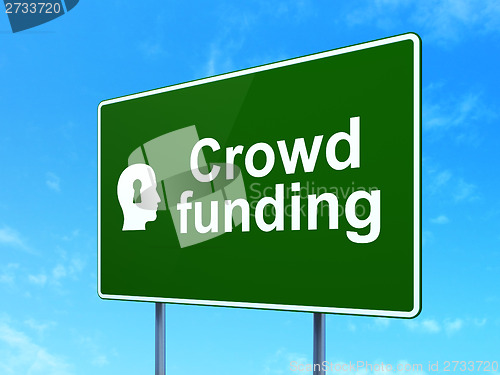 Image of Business concept: Crowd Funding and Head With Keyhole