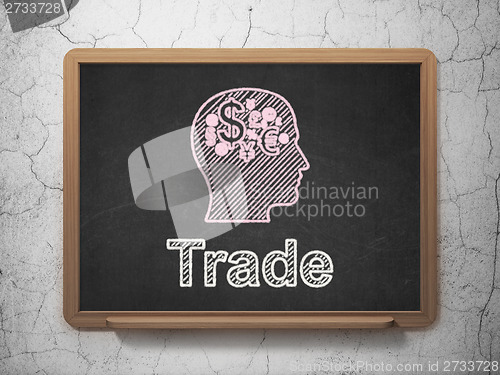 Image of Business concept: Head With Finance Symbol and Trade on chalkboard background